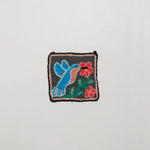 Oiseau bleu et rouge